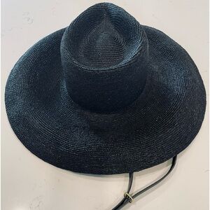 Super trendy straw luxury brand hat. Size small. Janessa Leone California